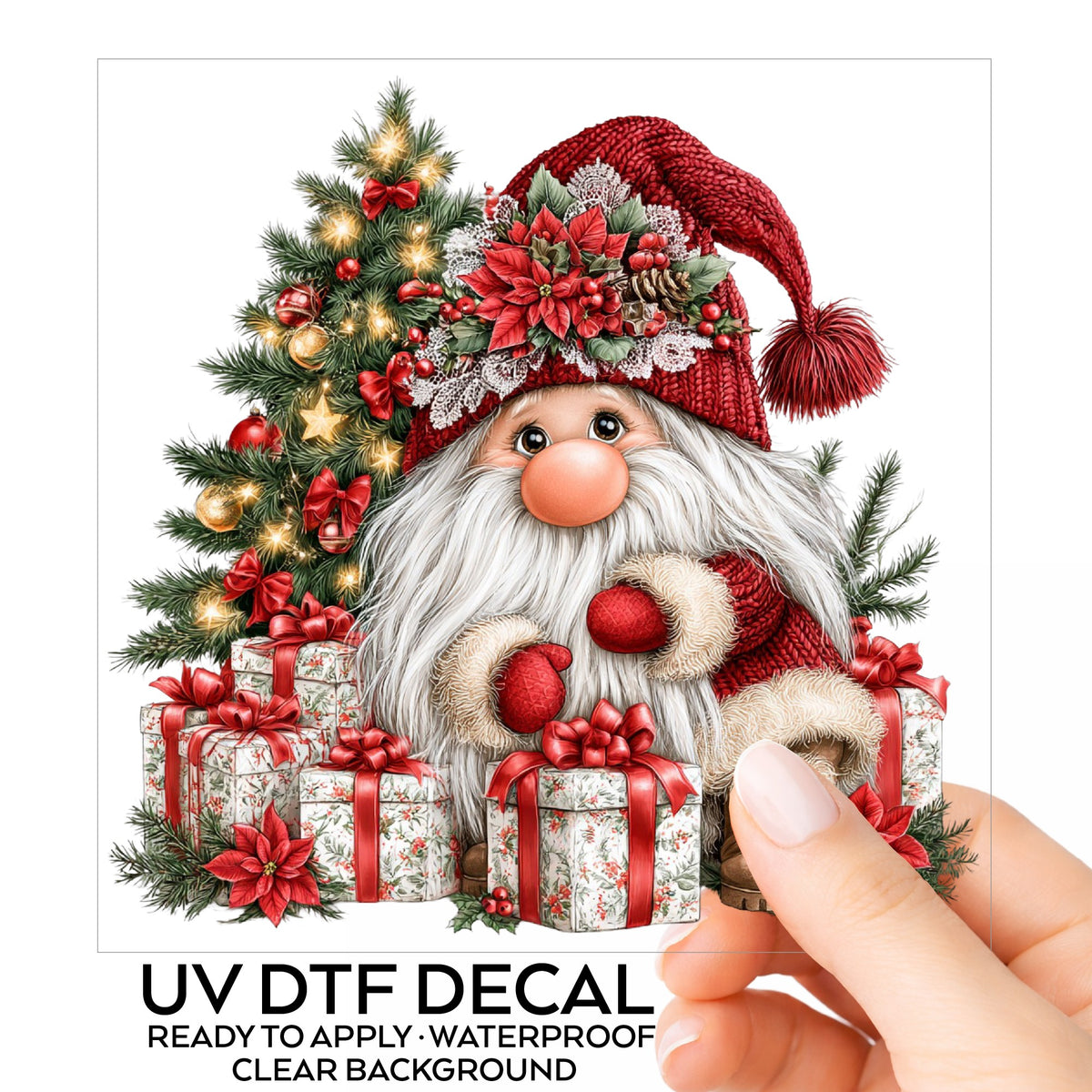 Gnome With Wrapped Presents And Lighted Tree UV DTF sticker on its backing card, held in hand