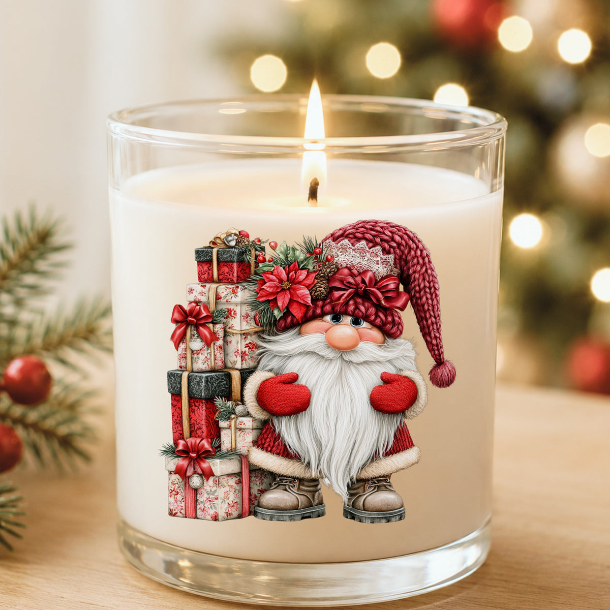Gnome With Tall Floral Gift Tower UV DTF sticker applied to a white candle in a glass holder near Christmas lights