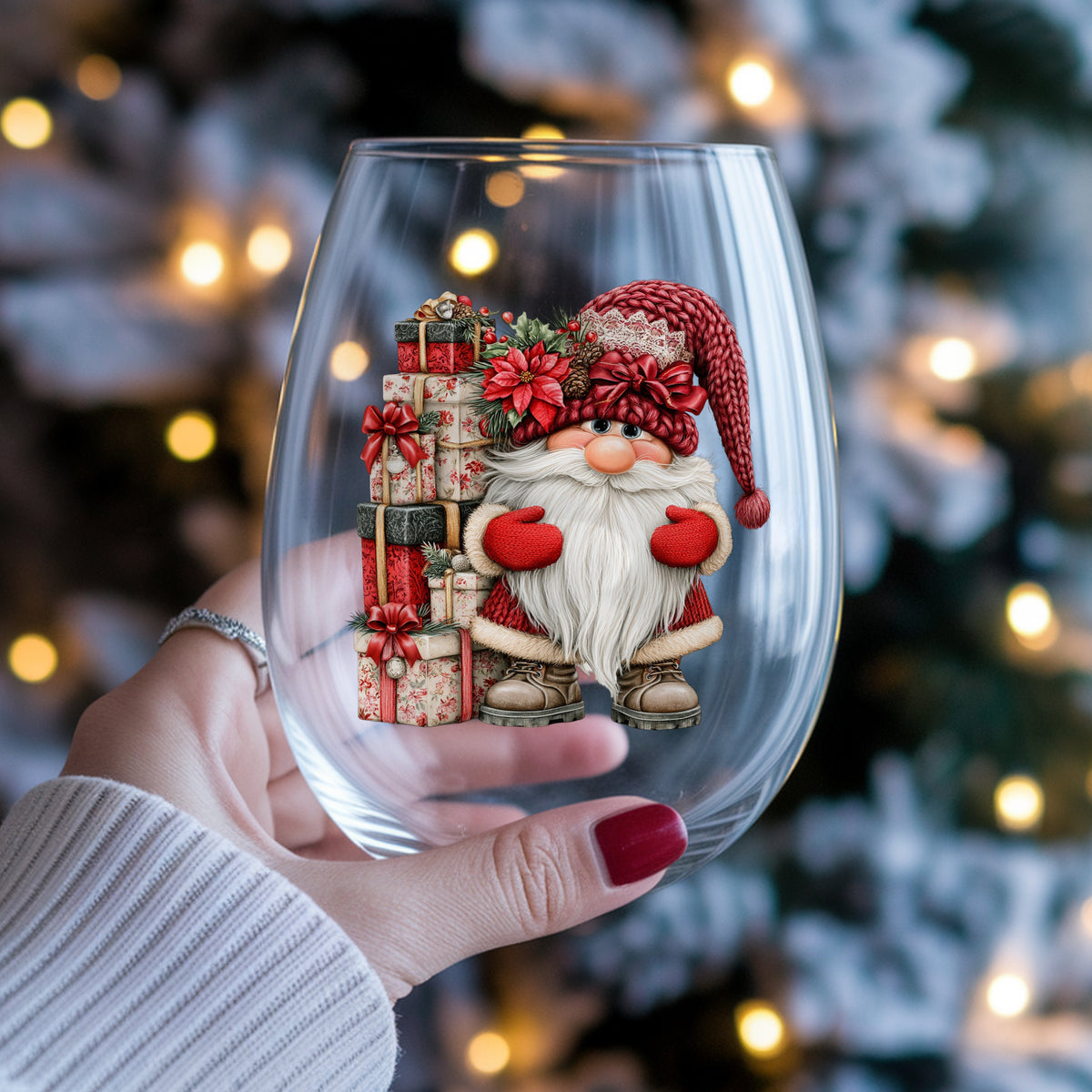 Gnome With Tall Floral Gift Tower UV DTF sticker applied to a stemless wine glass held in hand