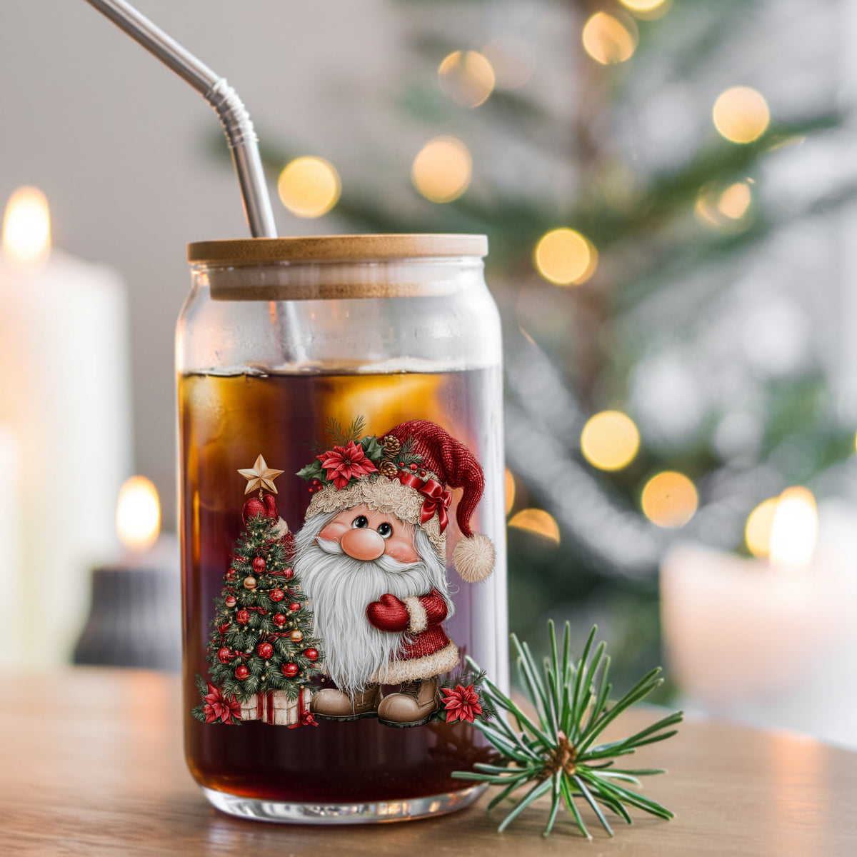 Gnome Putting Star On Christmas Tree UV DTF sticker applied to a glass can cup of iced coffee with a straw