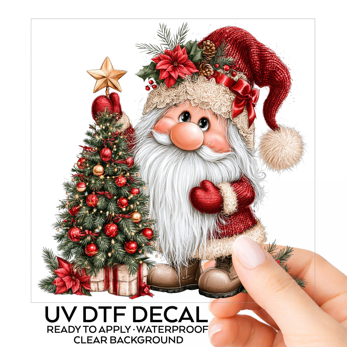 Gnome Putting Star On Christmas Tree UV DTF sticker on its backing card, held in hand