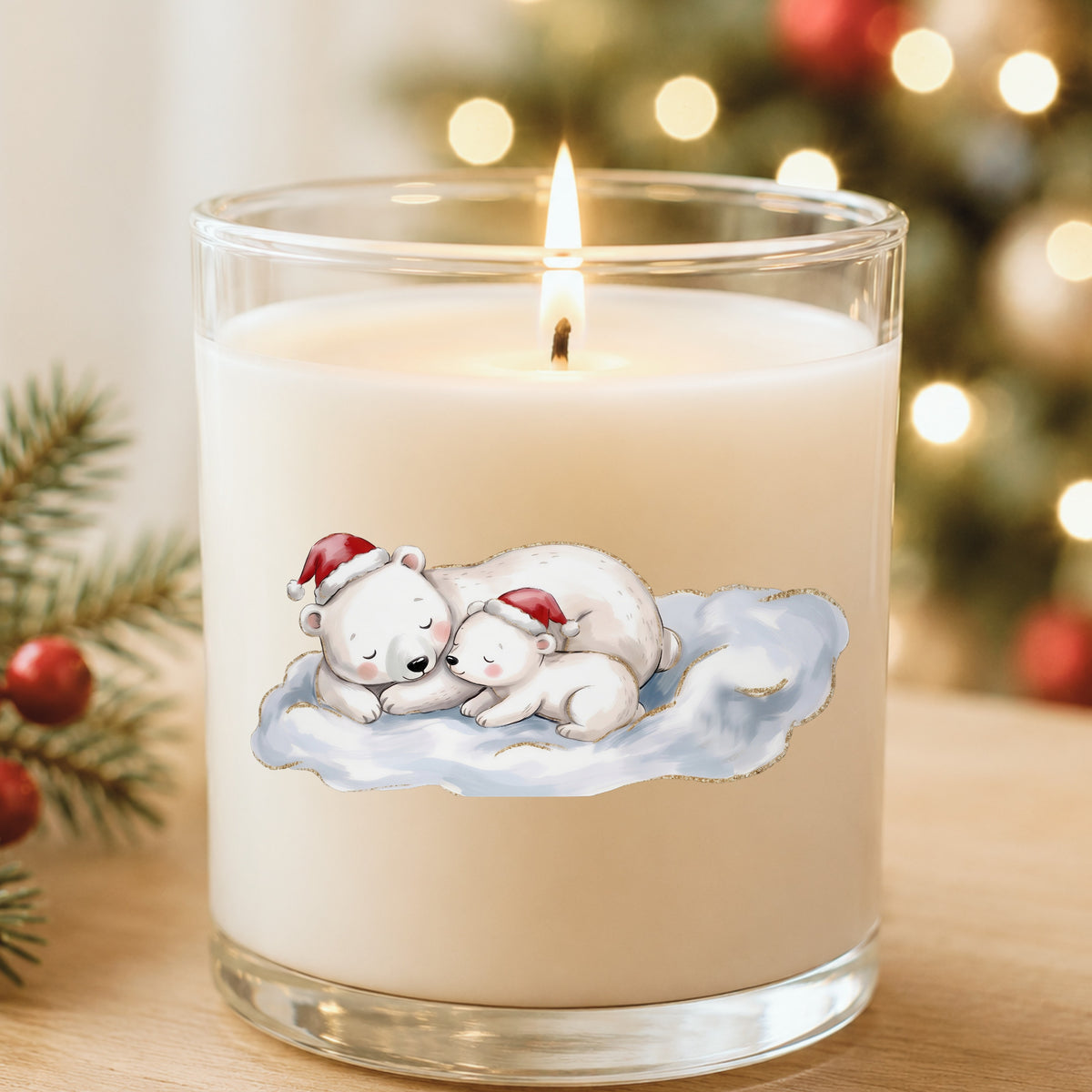 Sleeping Polar Bear And Cub In Santa Hats UV DTF sticker applied to a white candle in a glass holder near Christmas lights