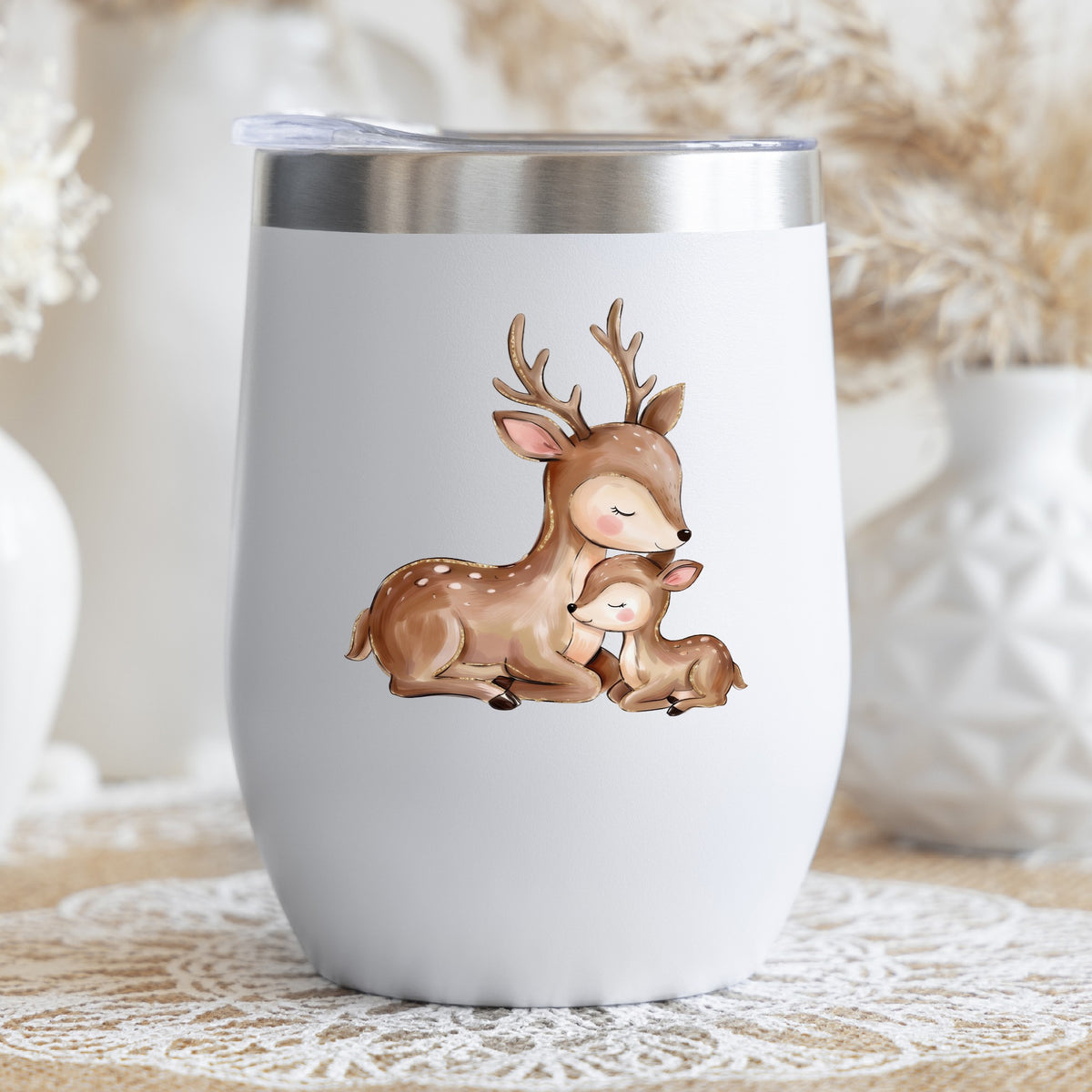 Mother Deer And Fawn UV DTF sticker applied to a white stemless tumbler with a lid
