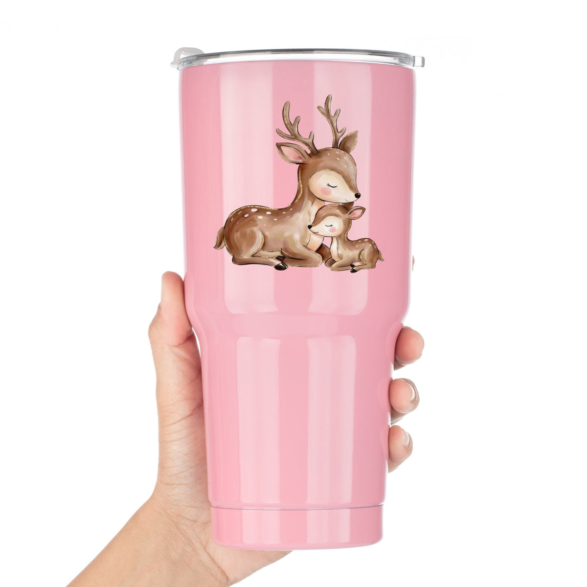 Mother Deer And Fawn UV DTF sticker applied to a pink tumbler held against a white background