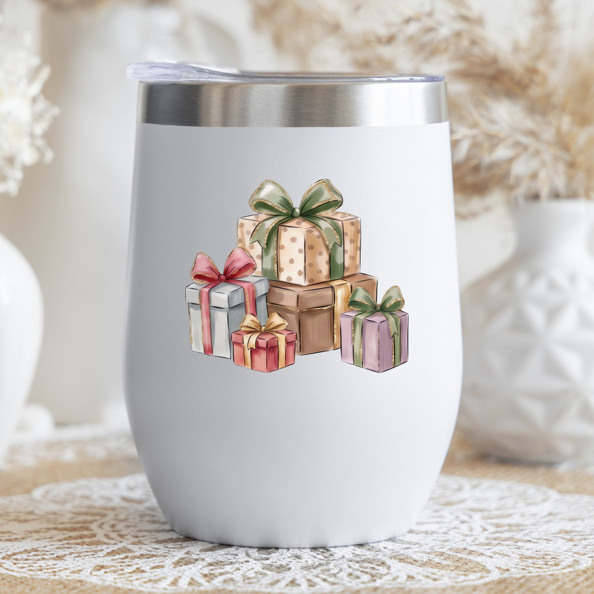 Pastel Gift Box Stack UV DTF sticker applied to a white stemless tumbler with a lid