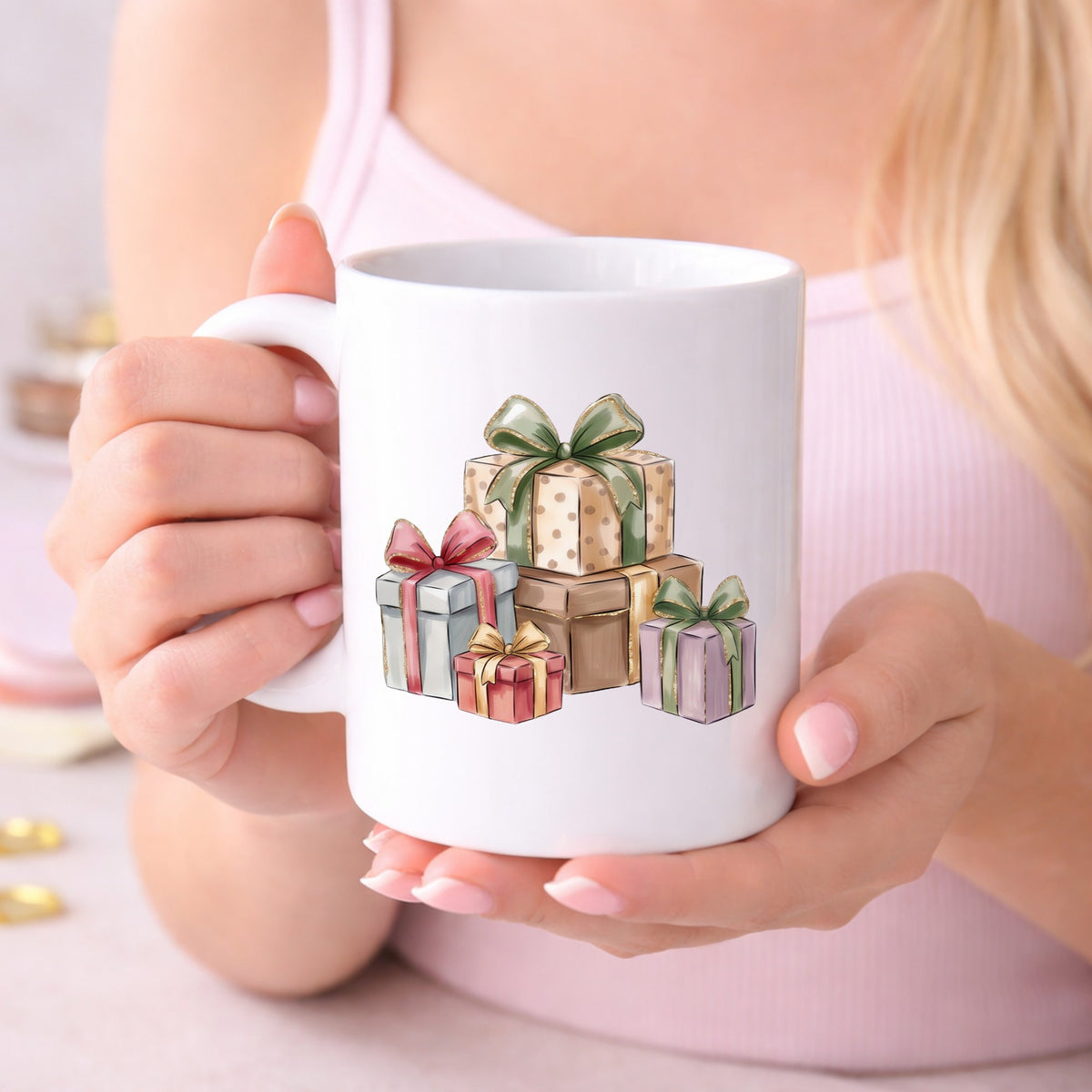 Pastel Gift Box Stack UV DTF sticker applied to a white coffee mug held in both hands