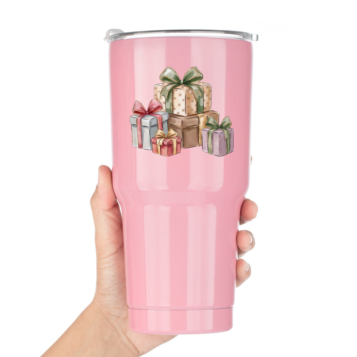 Pastel Gift Box Stack UV DTF sticker applied to a pink tumbler held against a white background