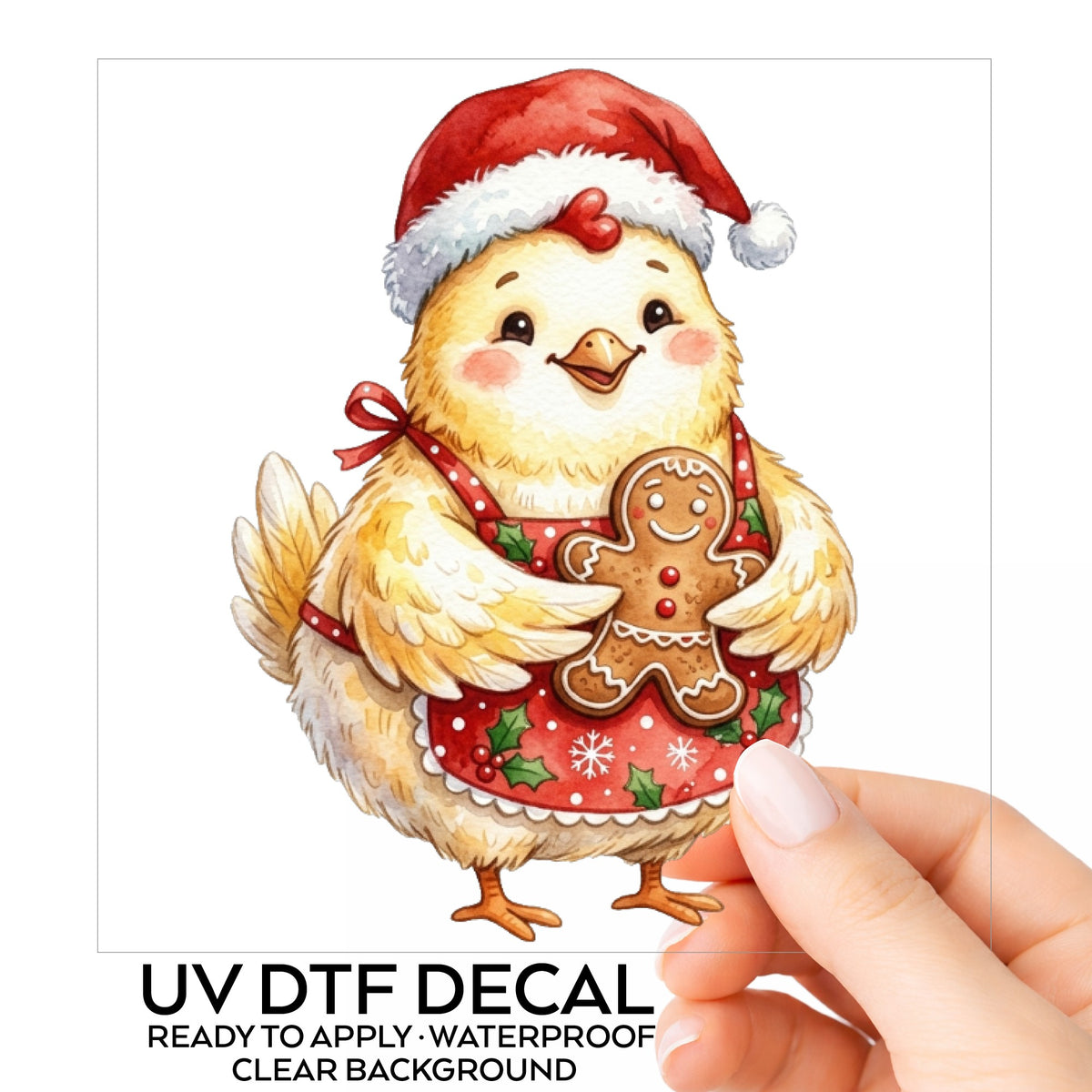 Chicken In Apron With Gingerbread Cookie UV DTF sticker on its backing card, held in hand