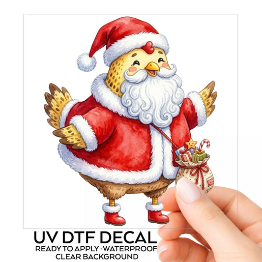 Chicken Dressed As Santa Claus UV DTF sticker on its backing card, held in hand