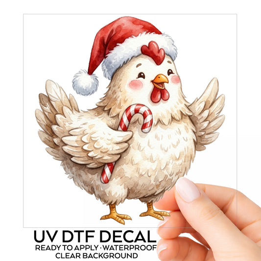 White Hen With Candy Cane UV DTF sticker on its backing card, held in hand