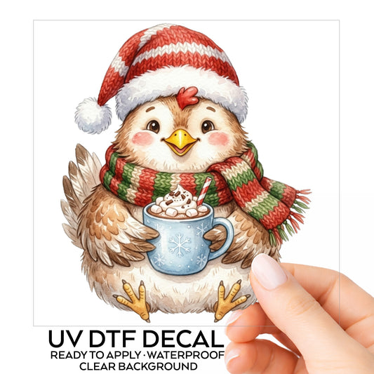 Chicken Holding Hot Cocoa Mug UV DTF sticker on its backing card, held in hand