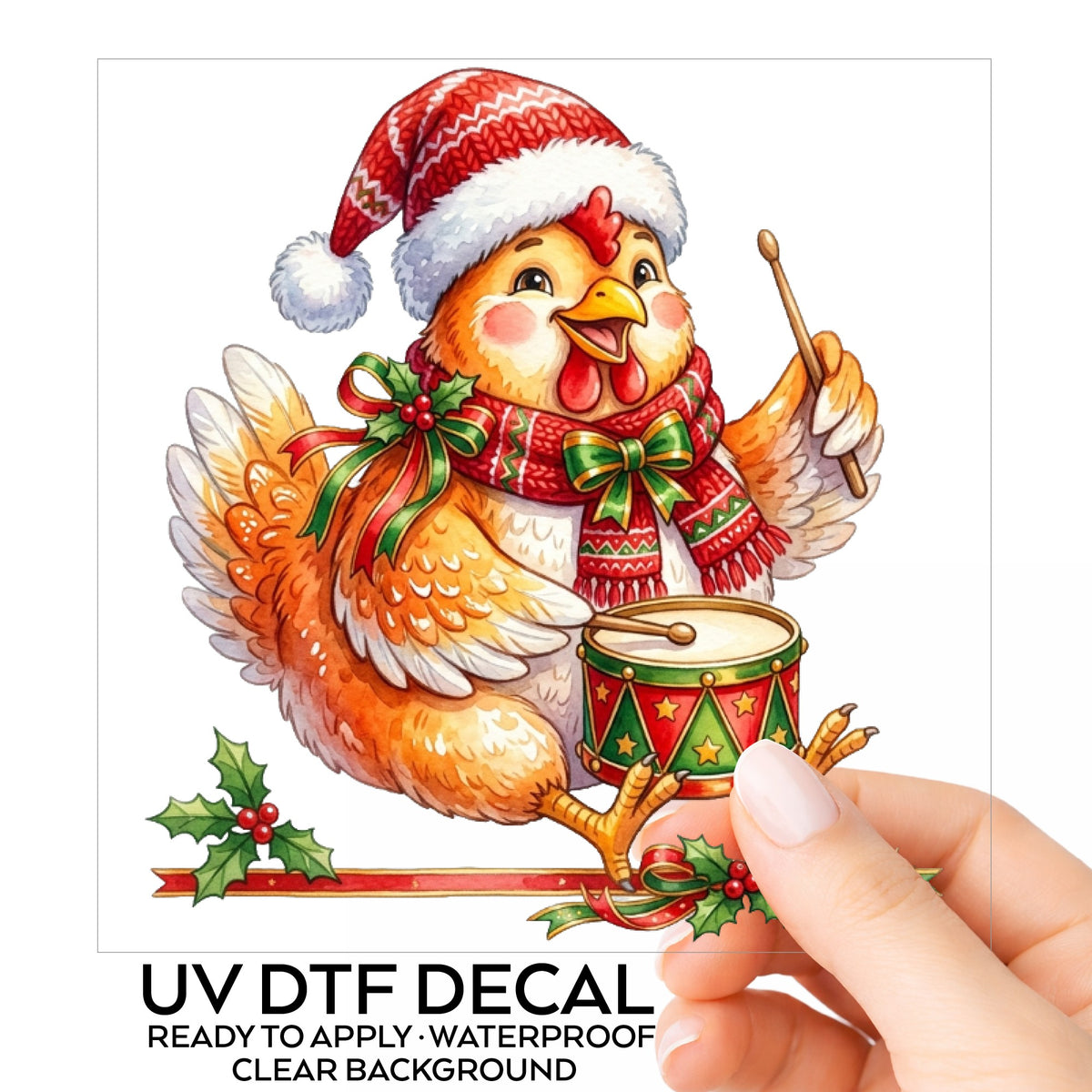 Rooster Playing Christmas Drum UV DTF sticker on its backing card, held in hand