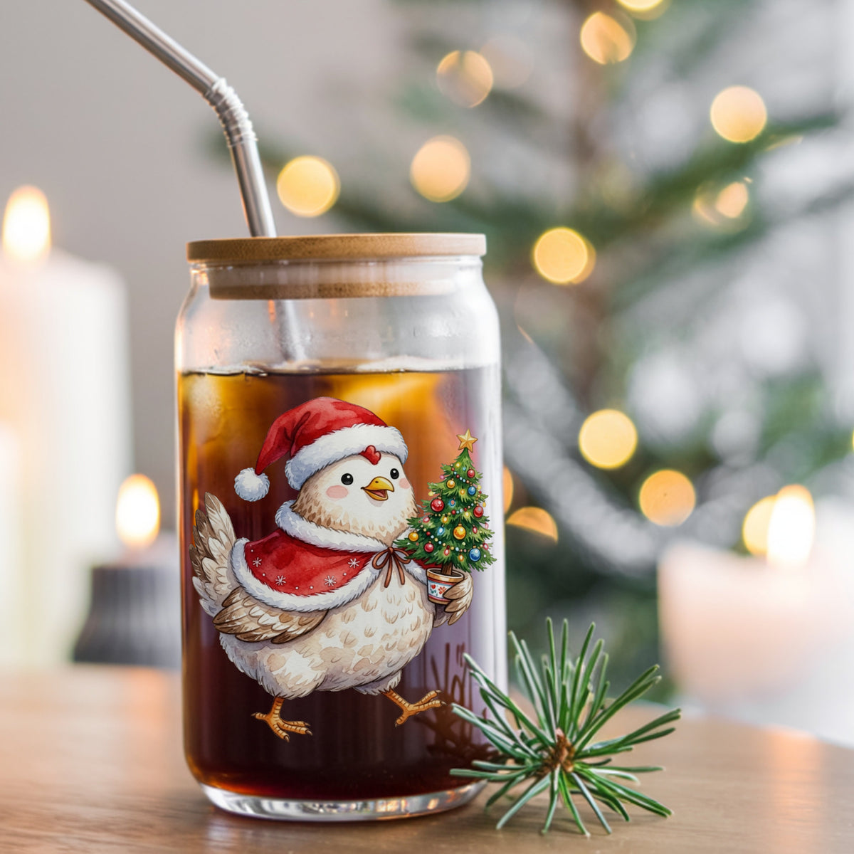Chicken Carrying Small Christmas Tree UV DTF sticker applied to a glass can cup of iced coffee with a straw
