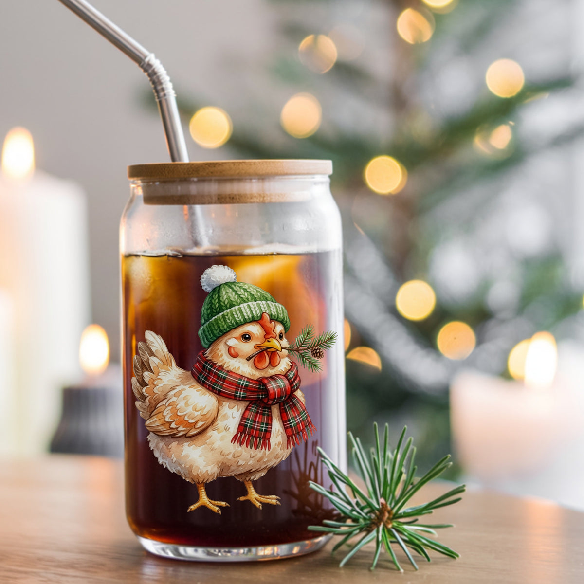 Plaid Scarf Hen With Pine Sprig UV DTF sticker applied to a glass can cup of iced coffee with a straw