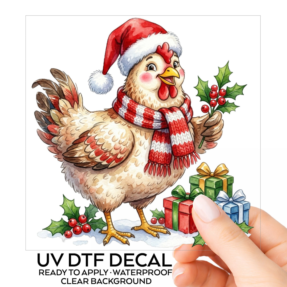 Hen With Holly And Presents UV DTF sticker on its backing card, held in hand
