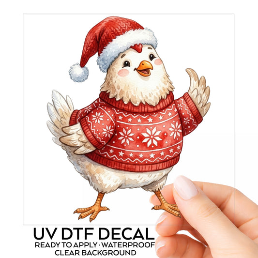 Chicken In Red Nordic Sweater UV DTF sticker on its backing card, held in hand