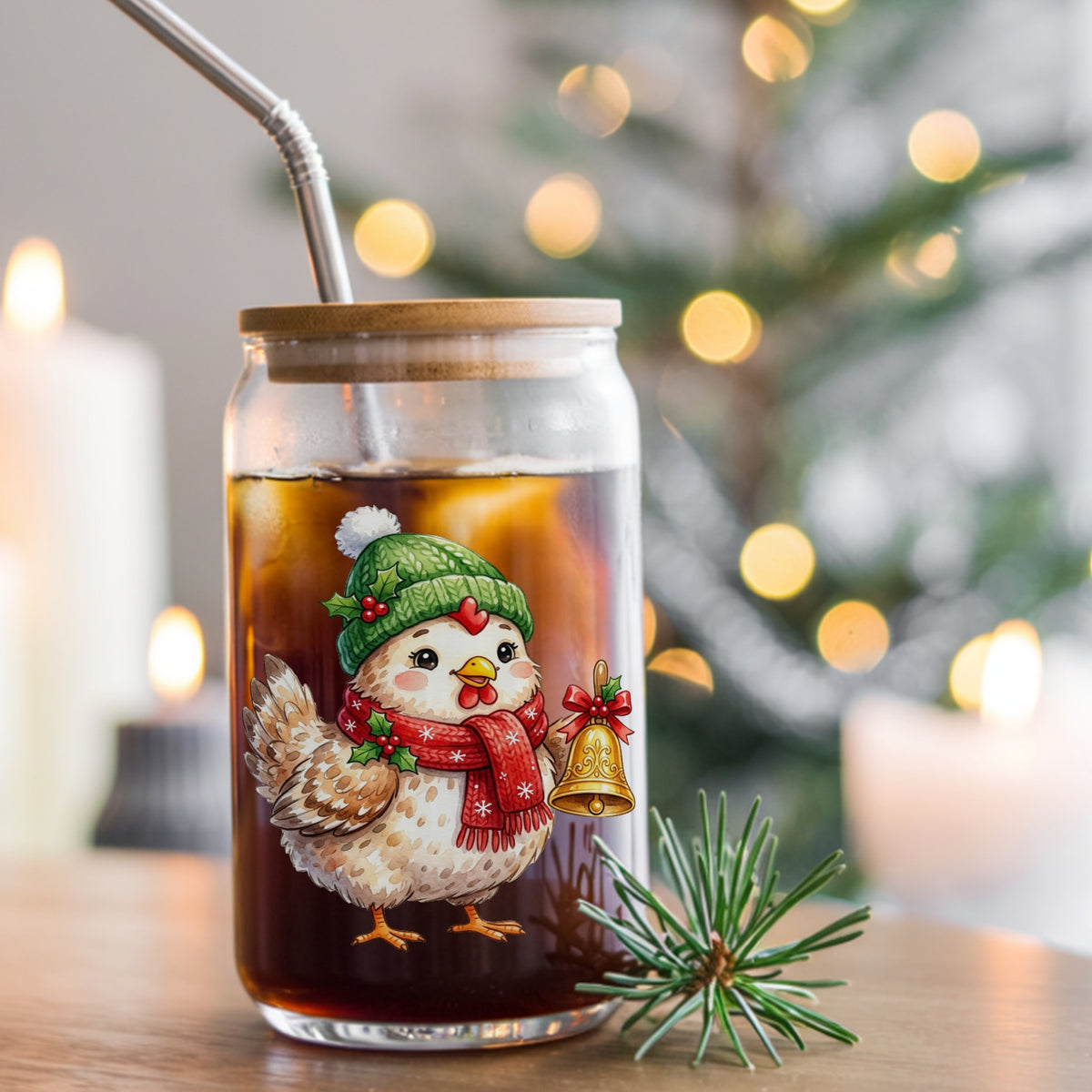 Chicken Holding Gold Jingle Bell UV DTF sticker applied to a glass can cup of iced coffee with a straw