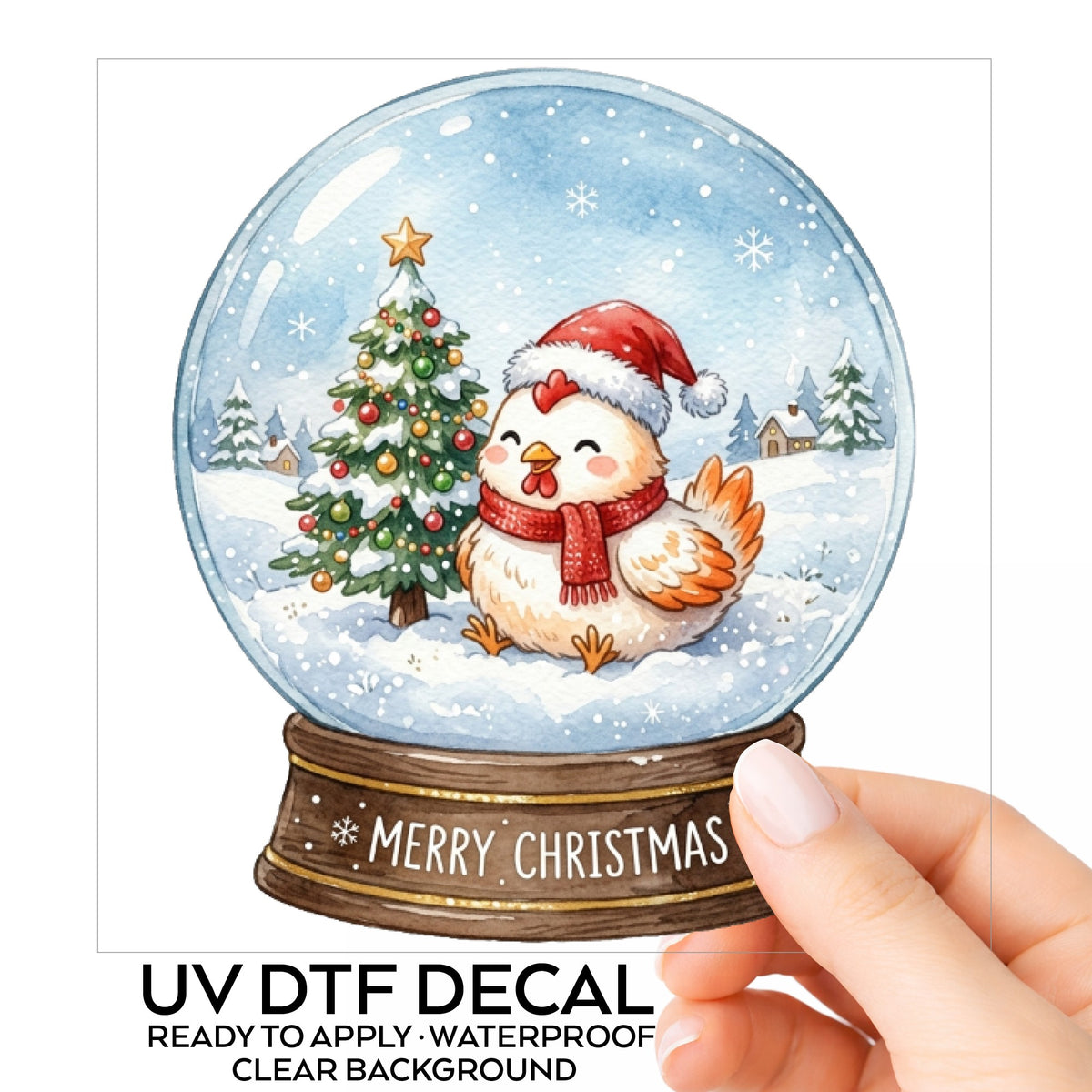 Merry Christmas Snow Globe Chicken UV DTF sticker on its backing card, held in hand