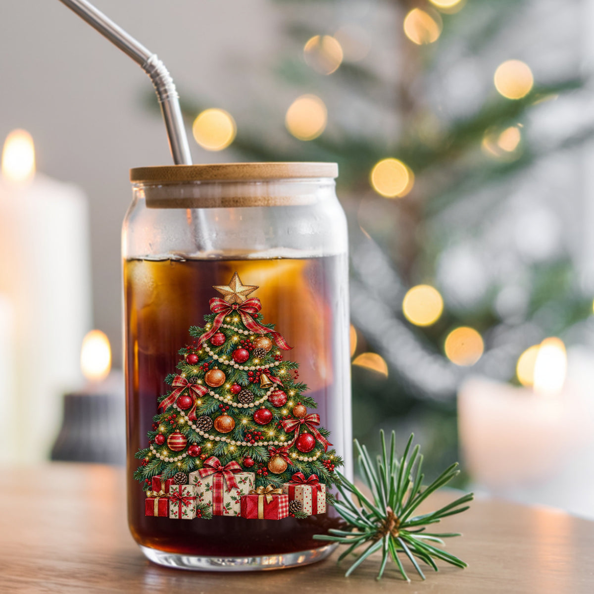 Decorated Christmas Tree With Presents UV DTF sticker applied to a glass can cup of iced coffee with a straw