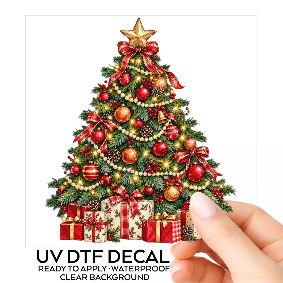 Decorated Christmas Tree With Presents UV DTF sticker on its backing card, held in hand