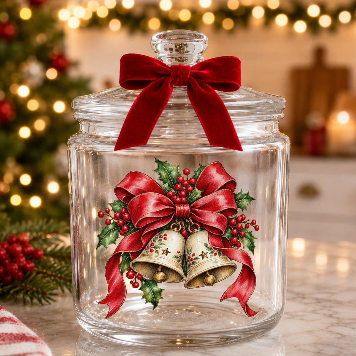 Christmas Bells With Red Bow UV DTF sticker applied to a glass candy jar tied with a red bow