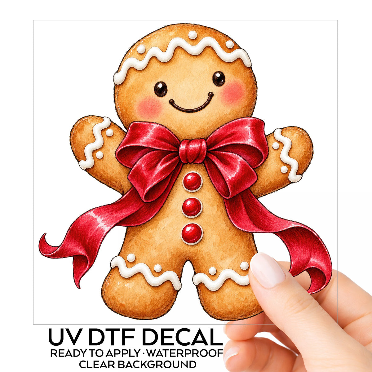 Gingerbread Man With Red Bow UV DTF sticker on its backing card, held in hand