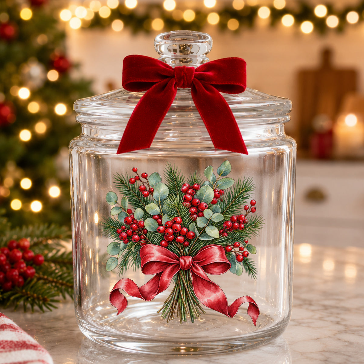 Winter Berry Bouquet With Red Bow UV DTF sticker applied to a glass candy jar tied with a red bow