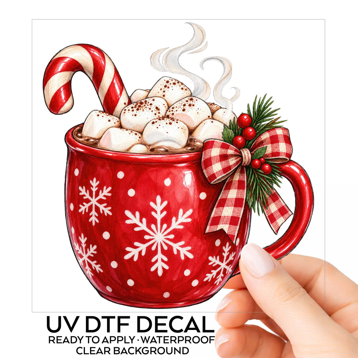 Hot Cocoa Mug With Marshmallows UV DTF sticker on its backing card, held in hand