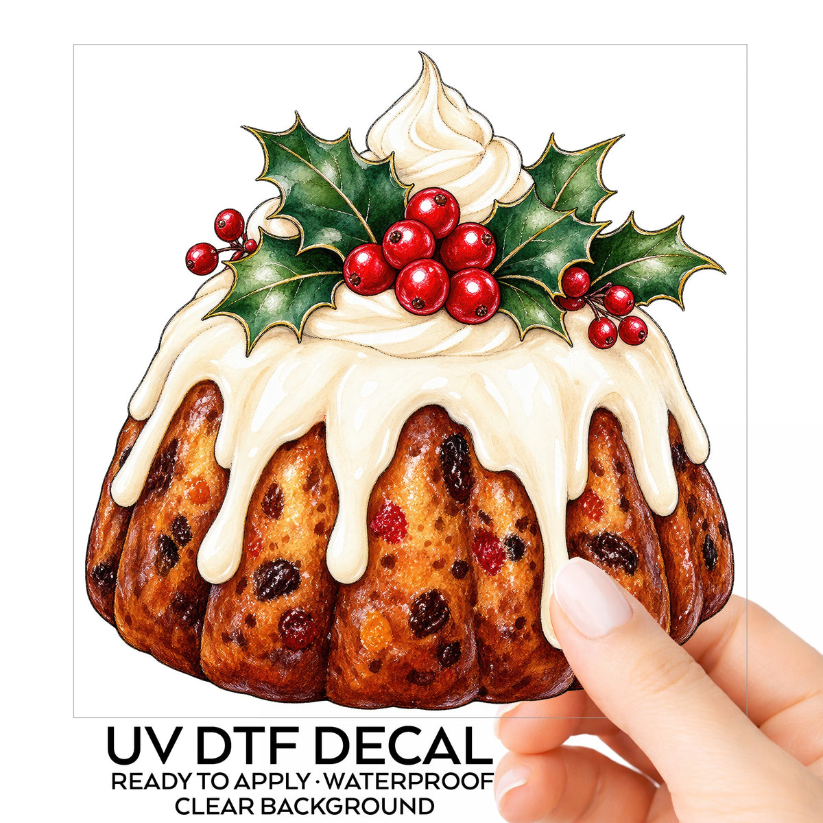 Christmas Fruitcake Bundt With Holly UV DTF sticker on its backing card, held in hand