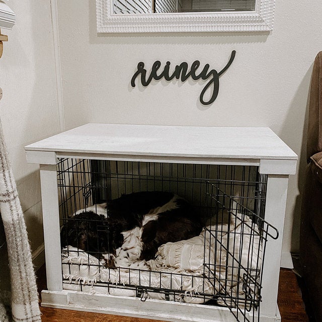 dog name sign over crate